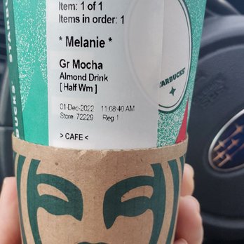 Starbucks - a person holding a starbucks cup - Coffee & Tea Near Me - Wood Village, Oregon Starbucks - a person holding a starbucks cup - Coffee & Tea Near Me - Wood Village, Oregon