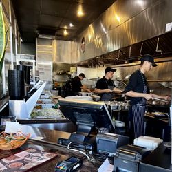 China Wok - The staff cooking up yummy food in the kitchen