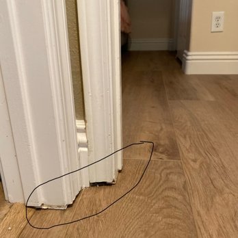 Moulding & Cabinet - Before: you can see the large gap (about 1") from door moulding to floor created by having floors replaced - Cabinetry Near Me Moulding & Cabinet - Before: you can see the large gap (about 1") from door moulding to floor created by having floors replaced - Cabinetry Near Me