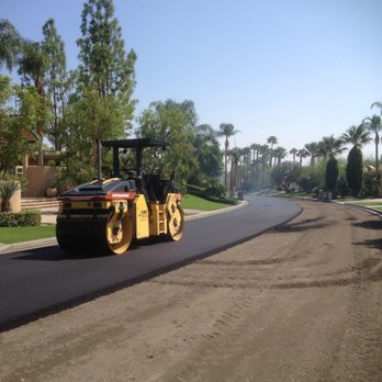 AMS Paving - a road being paved with asphalt - Masonry/Concrete Near Me - San Diego, California