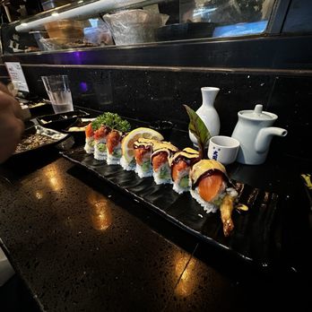 Kimu Sushi - Dragon Roll: Inside Tempura Shrimp, Outside Fresh Salmon - Sushi Bars Near Me - Long Beach, California Kimu Sushi - Dragon Roll: Inside Tempura Shrimp, Outside Fresh Salmon - Sushi Bars Near Me - Long Beach, California
