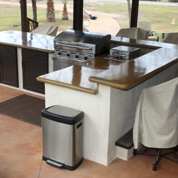 The Earth Builders - an outdoor kitchen with an island - Interior Design Near Me - Fresno, California The Earth Builders - an outdoor kitchen with an island - Interior Design Near Me - Fresno, California