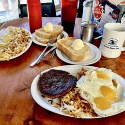 Spinach ham cheese and onion omelette. Burger, 3 eggs. Hash browns. Sourdough toast. Spinach ham cheese and onion omelette. Burger, 3 eggs. Hash browns. Sourdough toast.