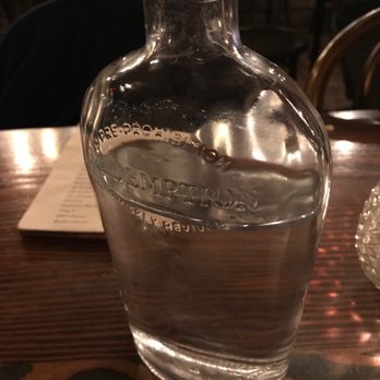 Gigglewaters - Love the repurposed bottles and trying to guess which ones the other tables have - American Near Me - Safety Harbor, Florida