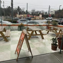 Outdoor seating in front of restaurant