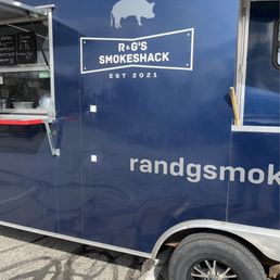 Here is a picture of the place, hauled behind a nice truck. Lots of room in the back for their smokers. Very nice and clean. Here is a picture of the place, hauled behind a nice truck. Lots of room in the back for their smokers. Very nice and clean.
