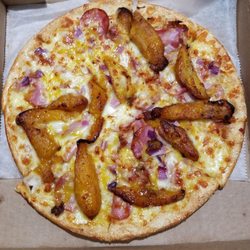 PieZoni's Pizza - Delicious small cuban pizza with extra honey mustard.