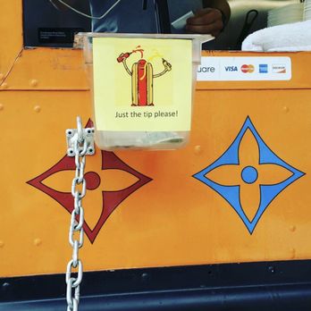 Angry Wiener - a man in a yellow bus - Food Trucks Near Me