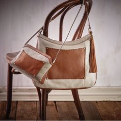 The Dotted Pig - We carry Hobo bags and wallets. We also offer special order to our to get exactly what you want