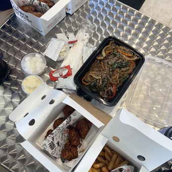Bonchon Brentwood - boneless half soy garlic half spicy chicken wings, fries, and japchae glass noodles Middle.  fries for 3 dollars Extra plus drink. - Korean Near Me - Brentwood, California