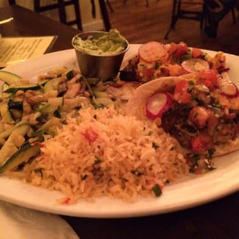 Tune-Up Cafe - Red snapper fish tacos with chipotle cream sauce and crispy vegetables. - New Mexican Cuisine Near Me - Santa Fe, New Mexico Tune-Up Cafe - Red snapper fish tacos with chipotle cream sauce and crispy vegetables. - New Mexican Cuisine Near Me - Santa Fe, New Mexico