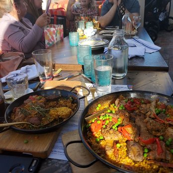 Cafe Sevilla - AS YOU CAN SEE. EVERYONE ARE GIVING MY SIS HERS GIFTS. I JUST GOT MY FOOD - Spanish Near Me - Costa Mesa, California