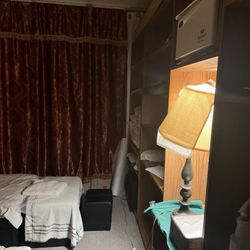 Tao SPA - Outdated curtains and a towel over the lamp and just messiness where the towels were etc..