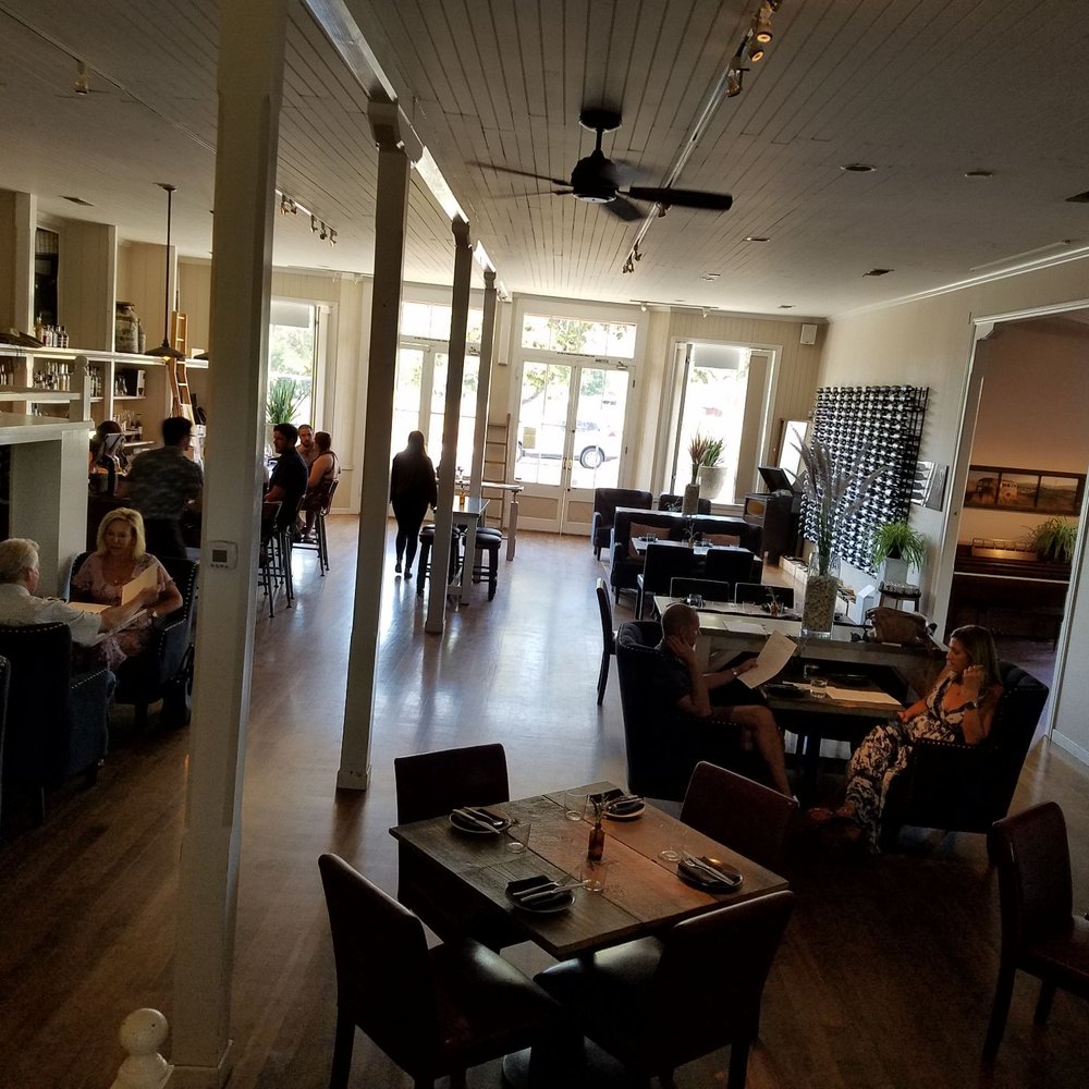 Pico - Tables are well-spaced for a private, romantic conversation. - Wine Bars Near Me - Los Alamos, California Pico - Tables are well-spaced for a private, romantic conversation. - Wine Bars Near Me - Los Alamos, California