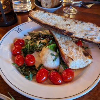 Mulberry Street Tavern - Burrata with tomatoes, basil, micro greens and fire roasted baguette - Bars Near Me - Des Moines, Iowa