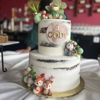 Yo Yo's Cakes - Chocolate cake with strawberries and whipped cream filling with semi-naked frosting - Bakeries Near Me Yo Yo's Cakes - Chocolate cake with strawberries and whipped cream filling with semi-naked frosting - Bakeries Near Me