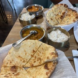 Shrimp Curry, Chicken Tikka Masala, onion naan, paneer naan.