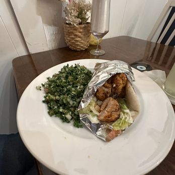 Bodrum Mediterranean Kitchen - My wife at the Chicken Shish Kebab Sandwich. She loved it as well as the  Tabouli salad. - Salad Near Me - Jacksonville, Florida