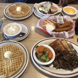 Free waffles on wednsday with purchase!!! Beef tip with vegetables, Breakfast Bowl with Bacon, appetizer sampler, grits and coffee.
