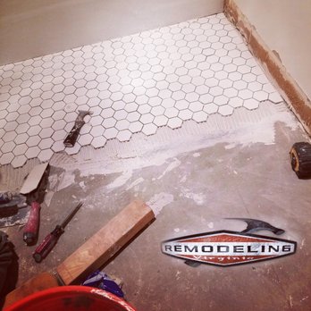 Remodeling In Virginia - a tile floor being installed - General Contractors Near Me - Falls Church, Virginia Remodeling In Virginia - a tile floor being installed - General Contractors Near Me - Falls Church, Virginia
