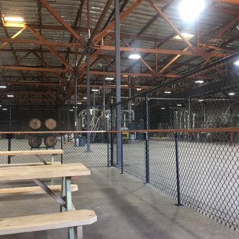 Revision Brewing - Open space with picnic tables and cornhole. - Breweries Near Me - Sparks, Nevada Revision Brewing - Open space with picnic tables and cornhole. - Breweries Near Me - Sparks, Nevada