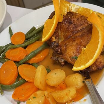 Lareira Restaurant - Duck a la orange (special) with mixed veggies - Portuguese Near Me - Mineola, New York Lareira Restaurant - Duck a la orange (special) with mixed veggies - Portuguese Near Me - Mineola, New York