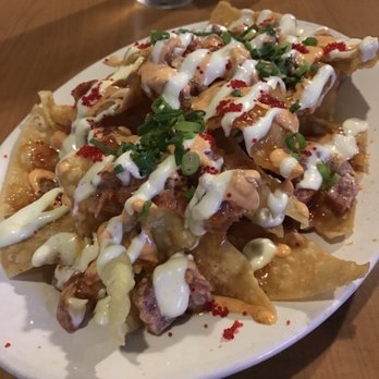 Restaurant 604 - The spicy ahi nachos- good, but would've liked less of the sauces. They were good, but overpowering. - Breakfast & Brunch Near Me - Honolulu, Hawaii