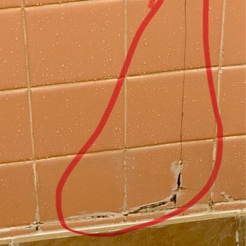 Big Bear Lodge - Crack in shower with water leaking through!! - Hotels Near Me - Alpena, Michigan Big Bear Lodge - Crack in shower with water leaking through!! - Hotels Near Me - Alpena, Michigan