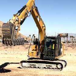 Dig This - Moving the tire pile.