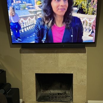 Blend Technology - 77 inch Tv & sound bar install over the fireplace. Re-wired the cables through the wall to leave no exposed cables. - Home Theatre Installation Near Me - Agoura Hills, California