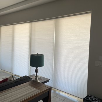 Luma Shutters and Blinds - Motorized cellular shades are a great option for patio doors. - Shades & Blinds Near Me