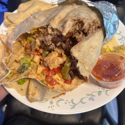 Full burrito fell apart and can't be picked up. I asked for nothing wet in the burrito so pretty poor folding skills Full burrito fell apart and can't be picked up. I asked for nothing wet in the burrito so pretty poor folding skills