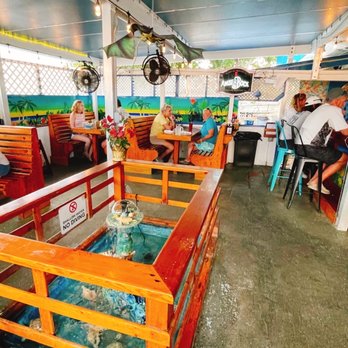 Cracked Conch Cafe - Dining room of flying iguana bar - Seafood Near Me - Marathon, Florida
