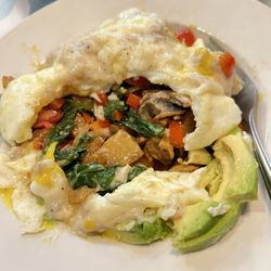 Family Table Cafe - Veggie breakfast bowl with a side of sausage gravy