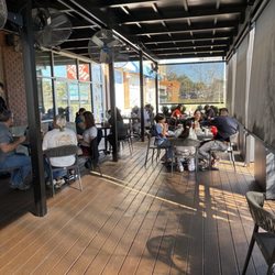 FirstWatch Cafe - Outdoor seating facing 200 enclosed