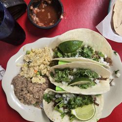 Esther's Authentic Mexican Cuisine - Shredded Beef Taco with beans and rice.