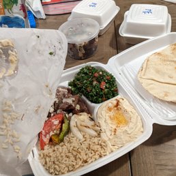 a meal in a styrofoam container
