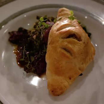 Black Rabbit - Braised beef hand pie, wilted cabbage, pork demi - Tapas/Small Plates Near Me - Nashville, Tennessee