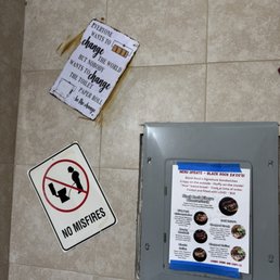 Signs in bathroom