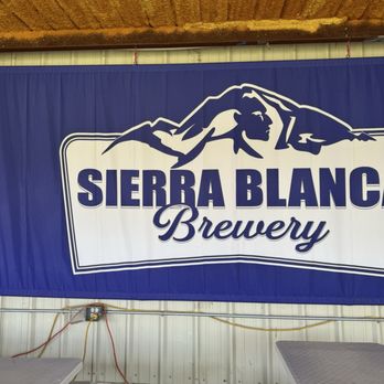 Sierra Blanca Brewing Company - Logo on patio - Breweries Near Me - Moriarty, New Mexico Sierra Blanca Brewing Company - Logo on patio - Breweries Near Me - Moriarty, New Mexico