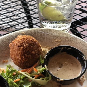 Mudbugs Cajun Kitchen - Boudin ball with sauce - Cajun/Creole Near Me - Sanibel, Florida Mudbugs Cajun Kitchen - Boudin ball with sauce - Cajun/Creole Near Me - Sanibel, Florida