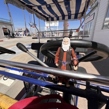 Seaside Bicycle Company - A Surrey quad-bike and Moses. - Bike Rentals Near Me - Newport Beach, California Seaside Bicycle Company - A Surrey quad-bike and Moses. - Bike Rentals Near Me - Newport Beach, California