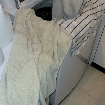 Payless Water Heaters - Installer's hose failed and spilled on personal items in my garage. We both jumped to clean up the mess. - Water Heater Installation/Repair Near Me