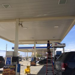 Arco - Busy cleaning up the signs.