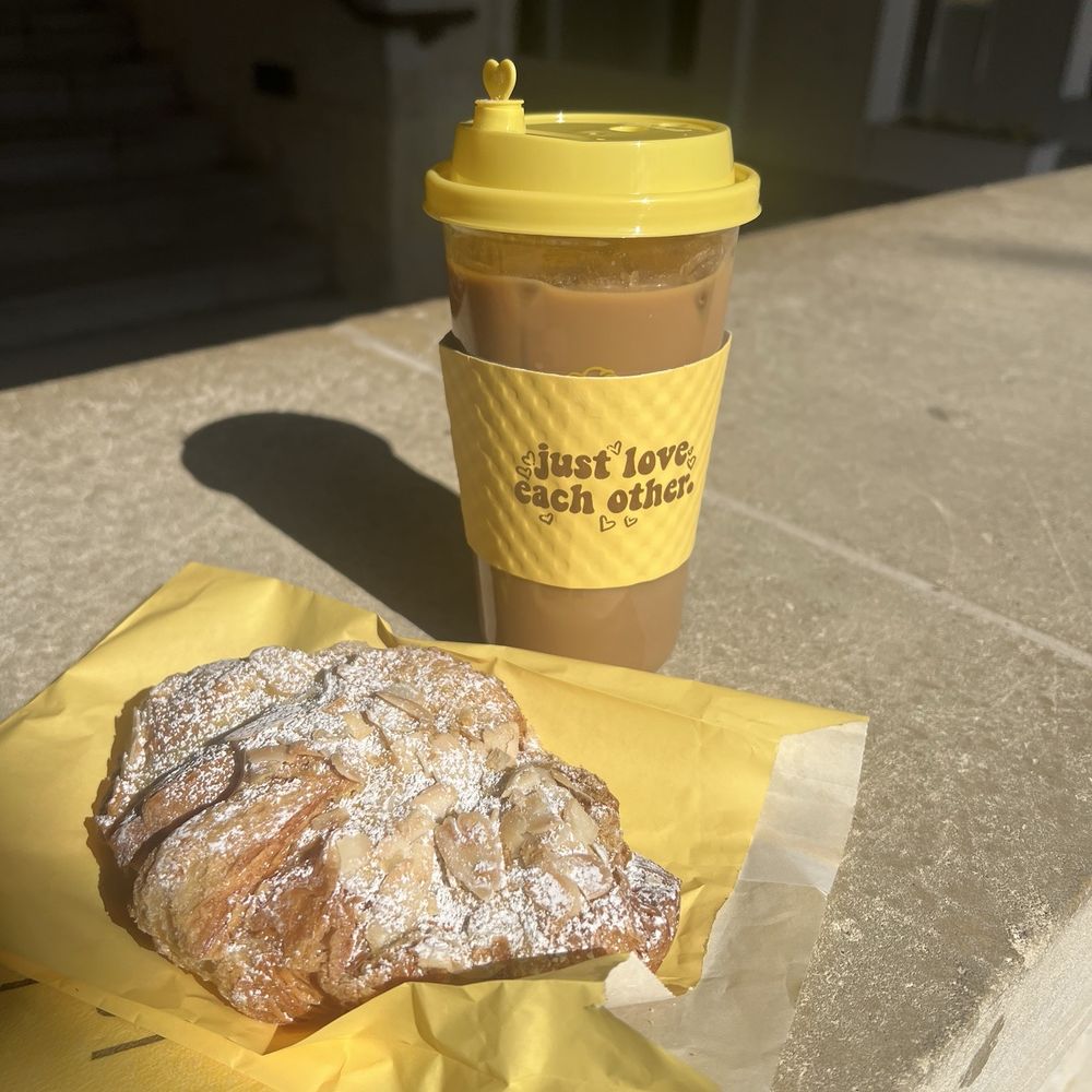 La La Land - Almond croissant and iced vanilla latte. - Coffee & Tea Near Me - San Antonio, Texas La La Land - Almond croissant and iced vanilla latte. - Coffee & Tea Near Me - San Antonio, Texas