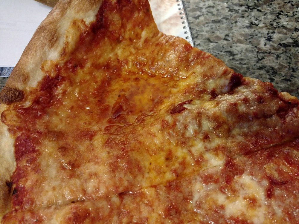 Johnny Roc's Pizza Plus Logo