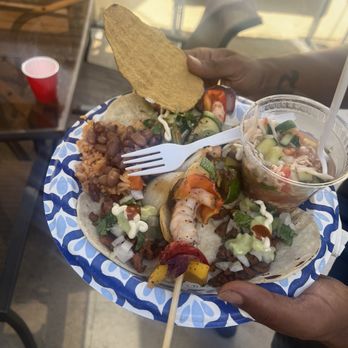 Eating Tacos - Shrimp skewer, tacos, ceviche, beans and rice - Caterers Near Me - Los Angeles, California