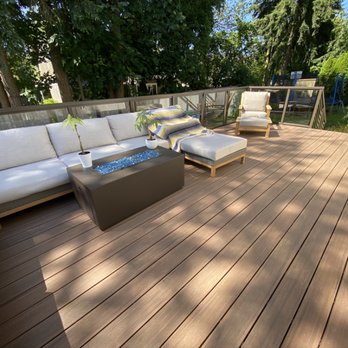 Industrial&Civil Construction - Deck in Kirkland. Glass railings and English Walnut ( trex Composit boards) - General Contractors Near Me - Auburn, Washington Industrial&Civil Construction - Deck in Kirkland. Glass railings and English Walnut ( trex Composit boards) - General Contractors Near Me - Auburn, Washington