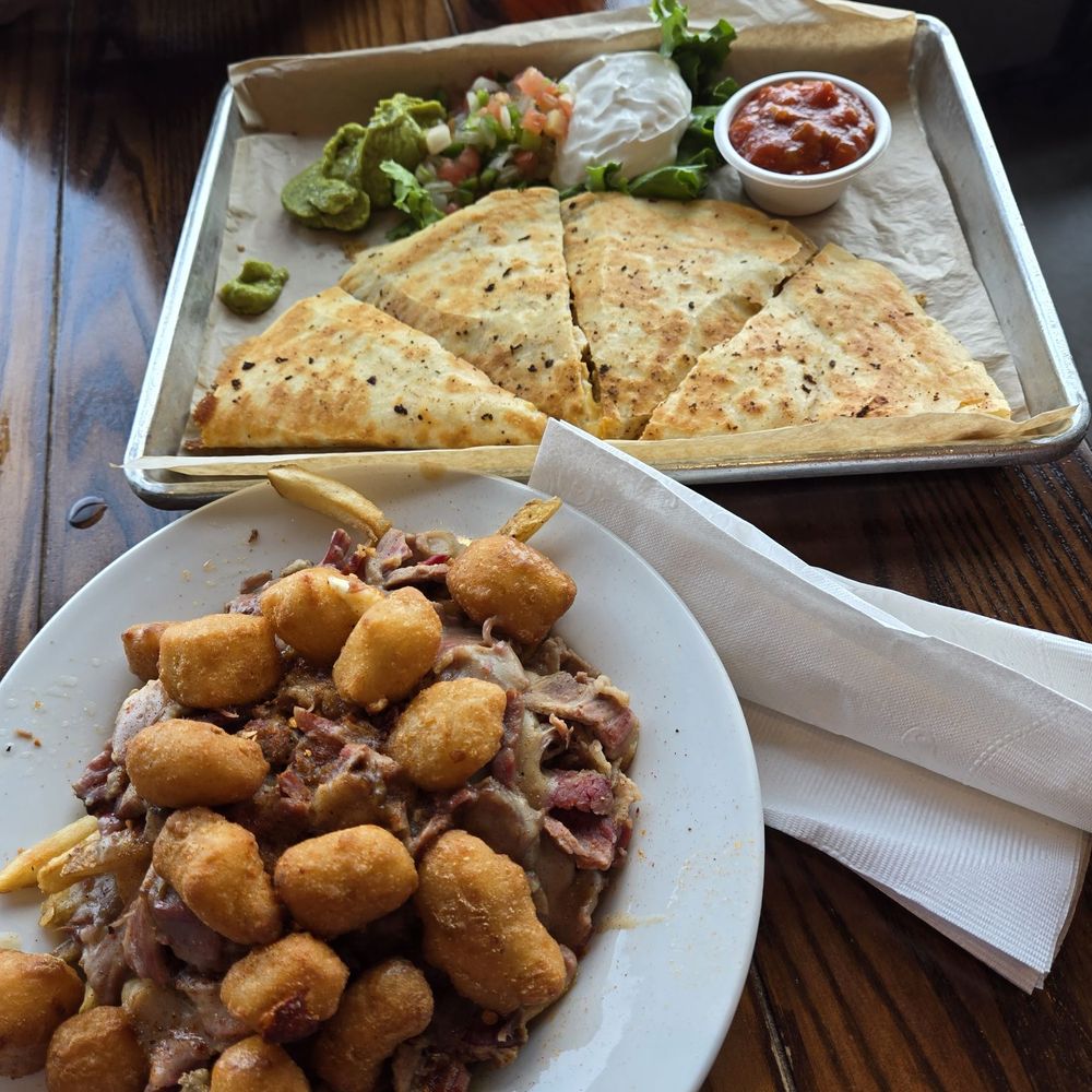 Blue Note - Poutine and chicken quesadillas - Sports Bars Near Me - St. Louis, Missouri Blue Note - Poutine and chicken quesadillas - Sports Bars Near Me - St. Louis, Missouri