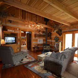 Antler Log Cabins Vacation Rentals - Wood stove